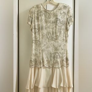 Destinee ….cream color silk…hand beaded Vintage dress.  Size 7/8